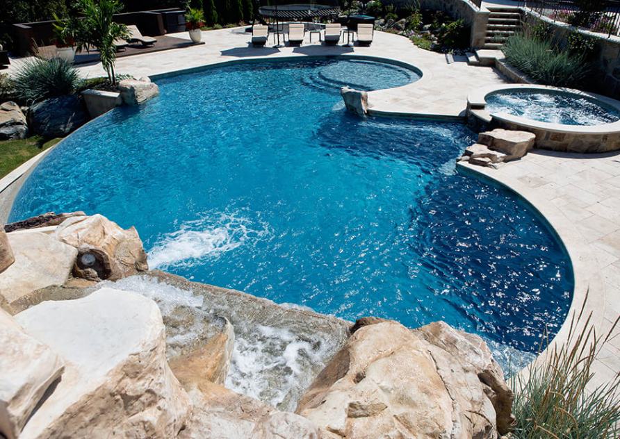 Freeform Pool Spa with Negative Edge and Waterfall