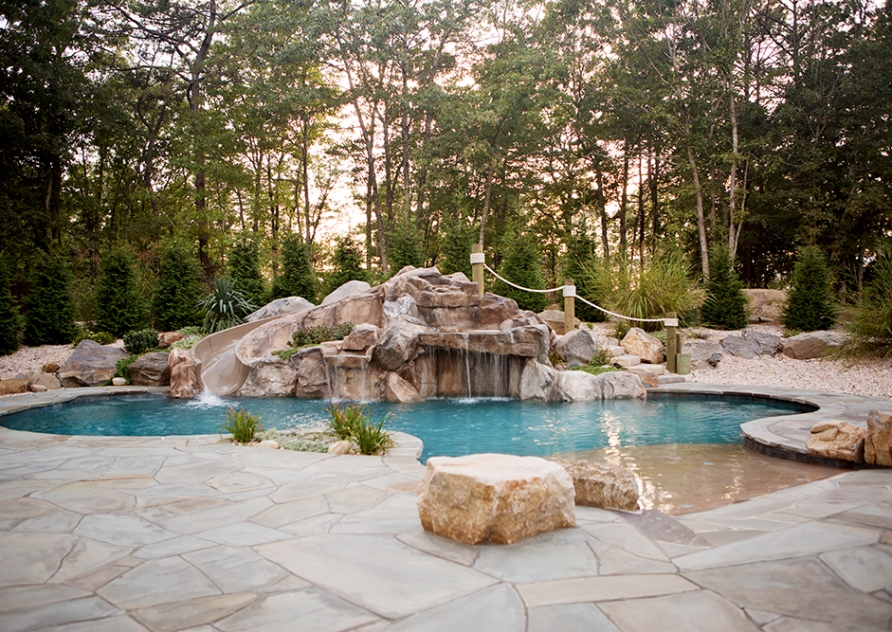 Freeform Pool with Rock Waterfall Slide and Tanning Ledge