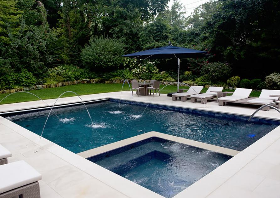 Traditional Pool and Spa with Deck Jets