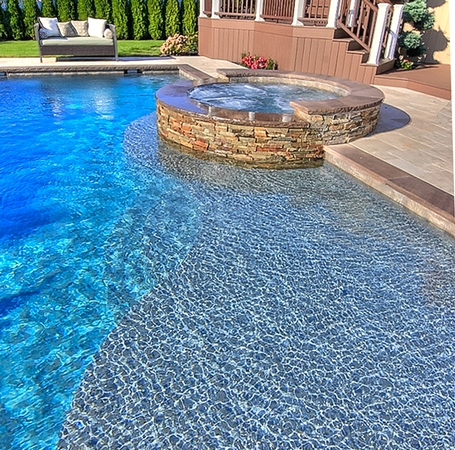Geometric Pool with Raised Spa and Sun Ledge